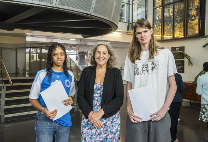 Mayor Woodley with two students who just received their results at Skinners Academy