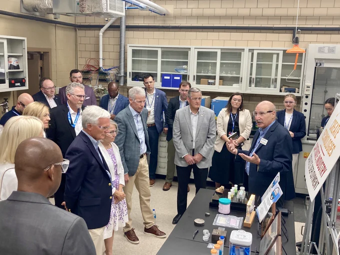 Tom Lograsso leads a discussion on rare earth recycling with Secretary Wright and guests. 
