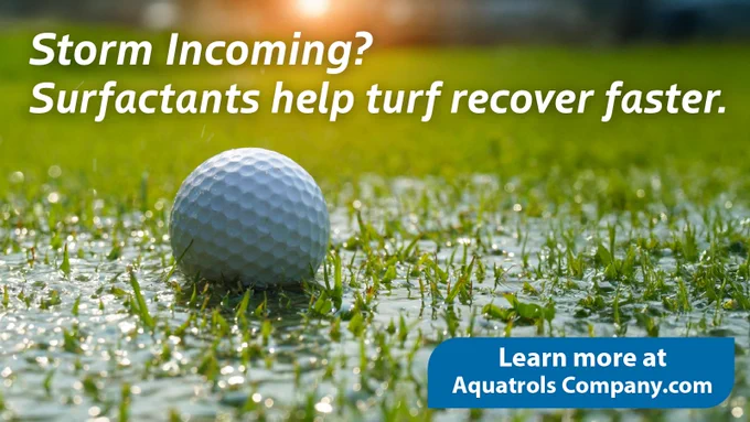 Advertisement featuring a golf ball on wet grass with text stating "Storm Incoming? Surfactants help turf recover faster." with a prompt to learn more at Aquatrols Company's website.