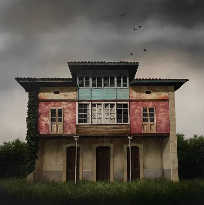 Large abandoned house with swifts flying above.
