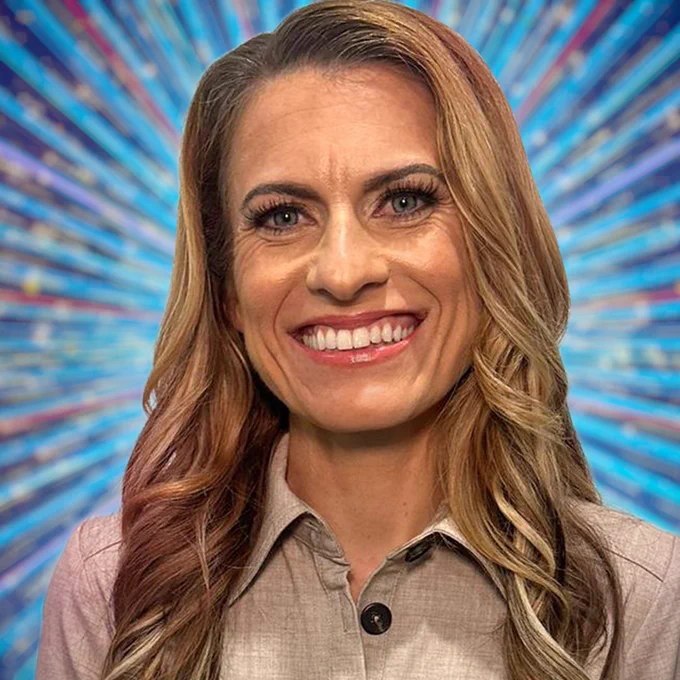 Karen Carney smiles to camera in a beige linen style shirt, set against a glittering blue background