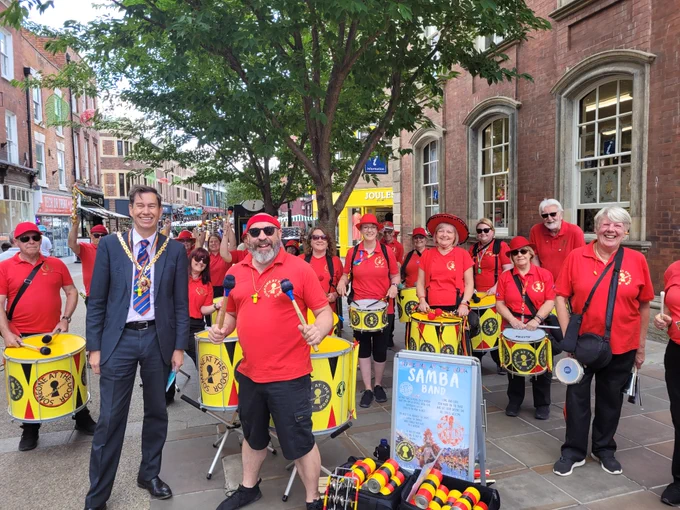 Matt Lamb with a samba band at Worcester Festival