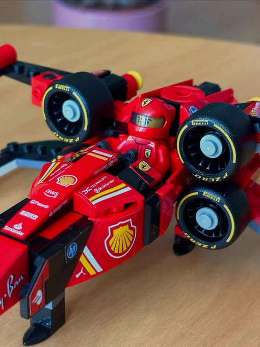 A Lego Formula 1 Ferrari car but redesigned to be the X-wing Starfighter.