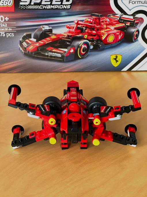 A Lego Formula 1 Ferrari car but redesigned to be the X-wing Starfighter.
