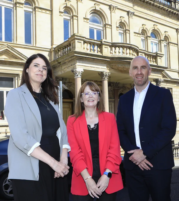 Photograph of Anne-Marie Gallagher, Project Director, St Columb's Hall, Economy Minister Dr Caoimhe Archibald and Brian O’Neill, Co-Chair, North West Community Wealth Building Partnership.
