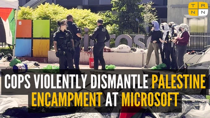 Photo of Redmond PD officers standing feet away from No Azure for Apartheid coalition members in the ruins of the dismantled Palestine encampment at Microsoft's headquarters in Redmond, WA, on Wed. Aug 20. Text on screen reads COPS VIOLENTLY DISMANTLE PALESTINE ENCAMPMENT AT MICROSOFT 