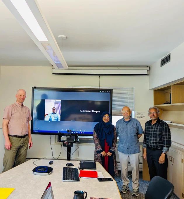 Safina Naznin with her thesis committee members: From left - Dr. Derek Johnson, Dr. Giassudin Ahsan (on screen), Safina Naznin, Dr Fikret Berkes (Defense Chair) and Dr C. Emdad Haque (Supervisor). Dr Nancy Kang (Committee Member) is not present in the photo. 