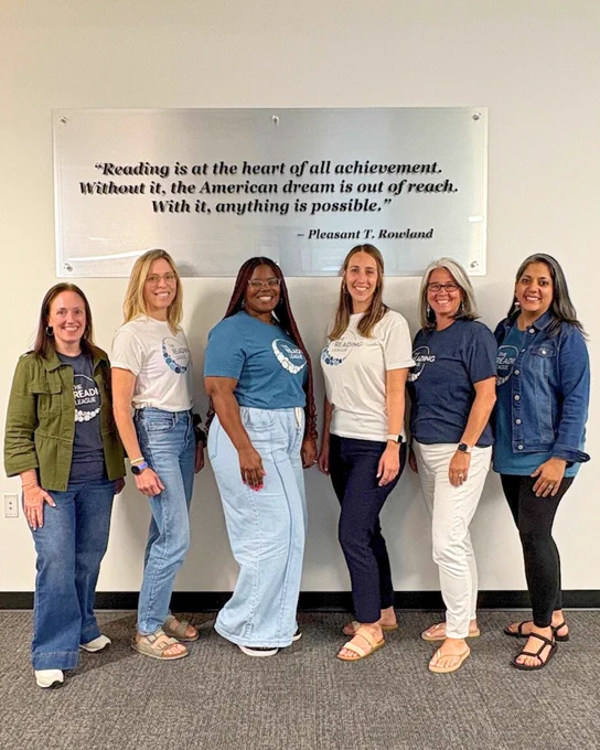 Six PD specialists pose at The Reading League headquarters in Syracuse NY during a Summer 2025 Training.