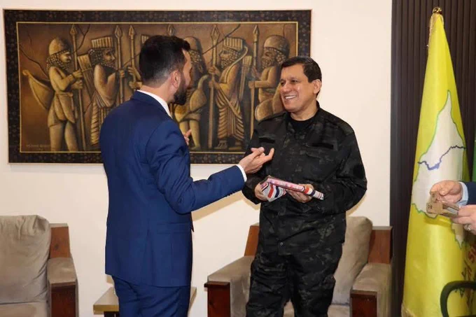 الجنرال مظلوم عبدي ليس مجرد قائد عسكري، بل هو رجل سلام وطني، يحمل رؤية سورية جامعة لا تفرّق بين أي مكوّن من مكوّنات شمال وشرق سوريا. في لقائي معه لمست إنسانيته وحرصه على حماية كل أبناء المنطقة، عربًا وكردًا وآشوريين وسريانًا وأرمنًا. إن خطاباته تنبذ الطائفية وتؤكد على التعايش المشترك كخيار لا بديل عنه. علينا جميعًا أن نقطع الطريق أمام أبواق الفتنة والتحريض التي تسعى لتمزيق نسيجنا، وأن نتمسّك بالوحدة التي ضحّى من أجلها الآلاف

———

General Mazloum Abdi is not only a military leader, but a man of peace and a true patriot. In my meeting with him, I witnessed his humanity and his genuine commitment to protect all the peoples of Northeast Syria — Kurds, Arabs, Assyrians, Syriacs, and Armenians alike. His message rejects division and embraces coexistence as the only path forward. We must stand united and silence the voices of hate and sectarian incitement that seek to divide our society.