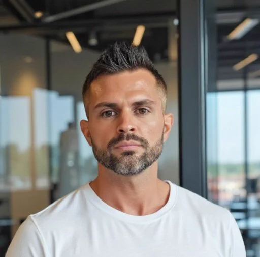 AJ Palermo the CEO of Primoria AI pictured in a white t-shirt. 