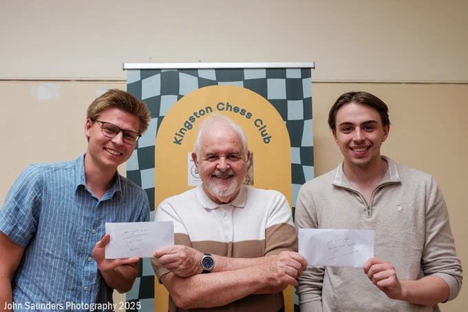 Norwegian FMs Jacob Templen Grave (left) and Gunnar Lund receive their prizes for finishing 1st equal in the 2025 Kingston Invitational Chess Open from Kingston Chess Club president John Foley.