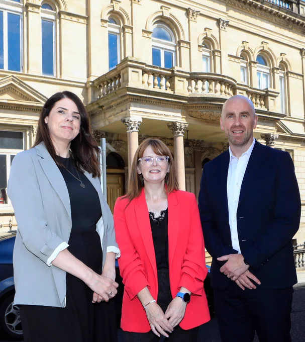 Minister for the Economy Caoimhe Archibald who met with members of the North-West Community Wealth Building Partnership at St. Columb's Hall. Included are Brian O'Neill, NW Community Wealth Building Partnership, and Annemarie Gallagher, project director, St. Columb's Hall Trust