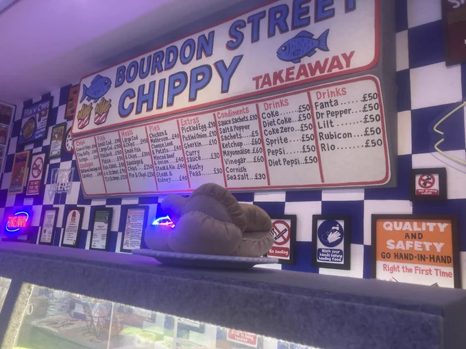 Hand sewn chip shop menu.