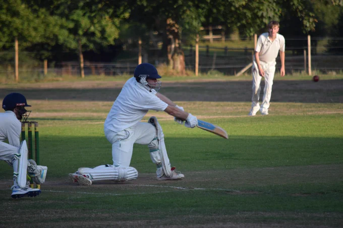 Harry cover drives on bended knee