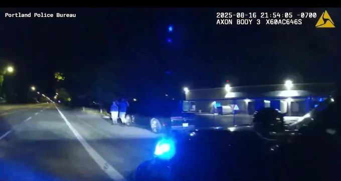 Officers talking to driver and passenger