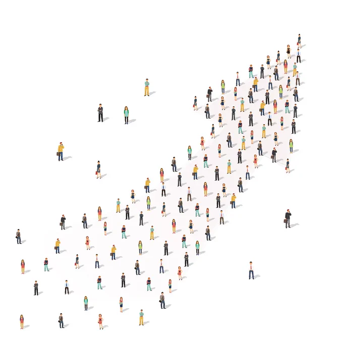 A digitally illustrated image showing a diverse group of small, stylised figures arranged in an upward-moving arrow pattern. The figures are scattered across a white background, with various clothing colours and styles, suggesting progress or a collective movement.