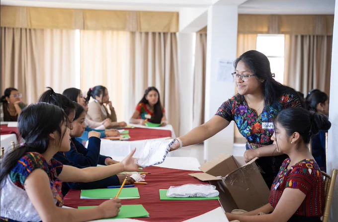 Wendy supports girl attendees at the Ellas al Frente conference