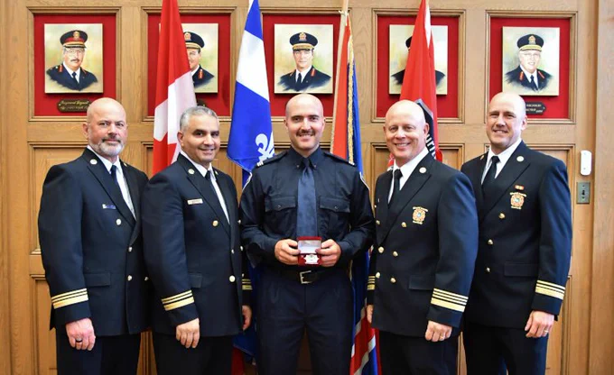 Gabriel Thibert being promoted to captain at Station 41