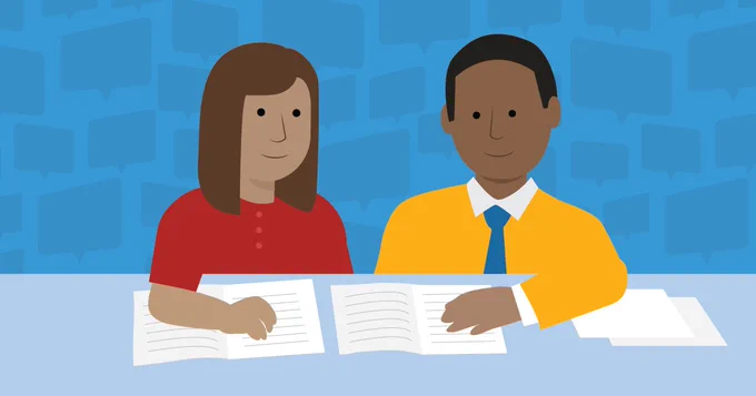 Illustration of two teachers who sit side by side at a table and look over testing manuals together