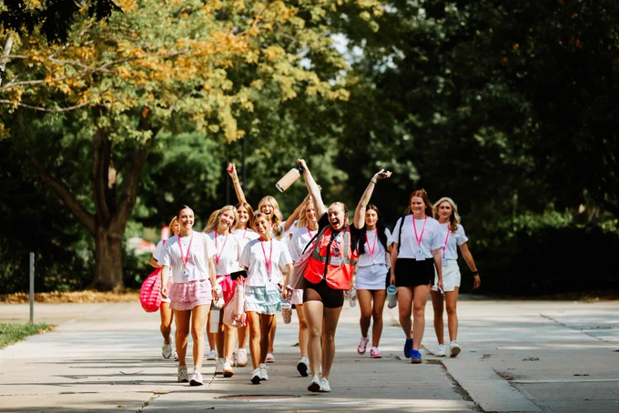 Sorority recruits walk across campus near the Nebraska Union on August 18.