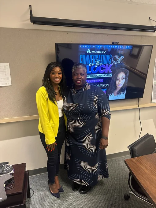 S B S Commissioner Dynishal Gross standing with Patricia Robinson at a recording session for Conversations on the Block