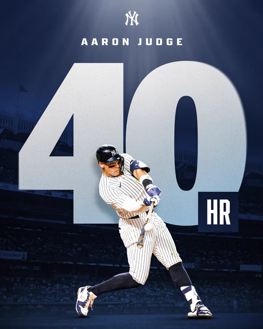 Aaron Judge 40 HR
Pictured: A cutout of Aaron Judge swinging wearing a white New York Yankees uniform with pinstripes.
