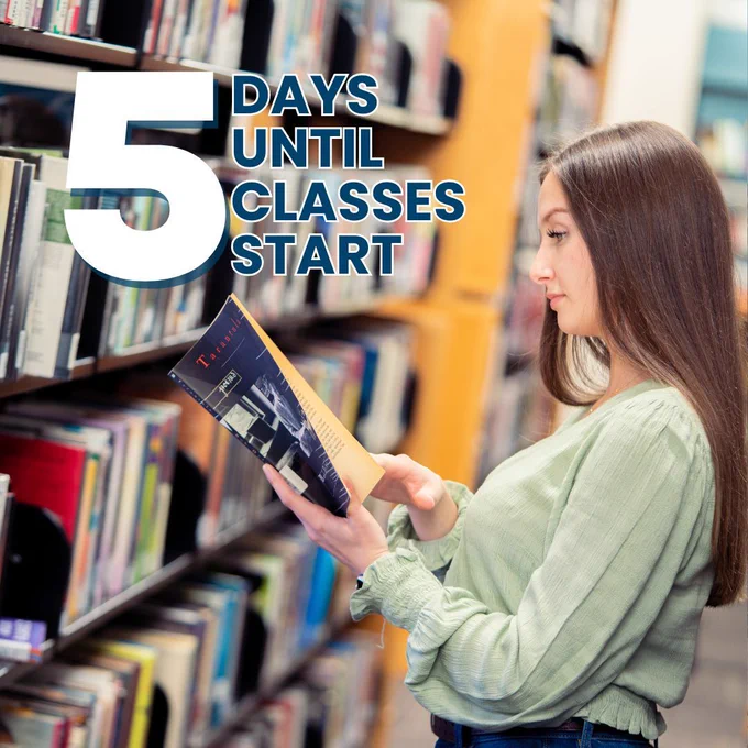 A student reading a book at the college's library aisle. Text reads: “5 DAYS UNTIL CLASSES START" to gear up for the start of the Fall semester. 