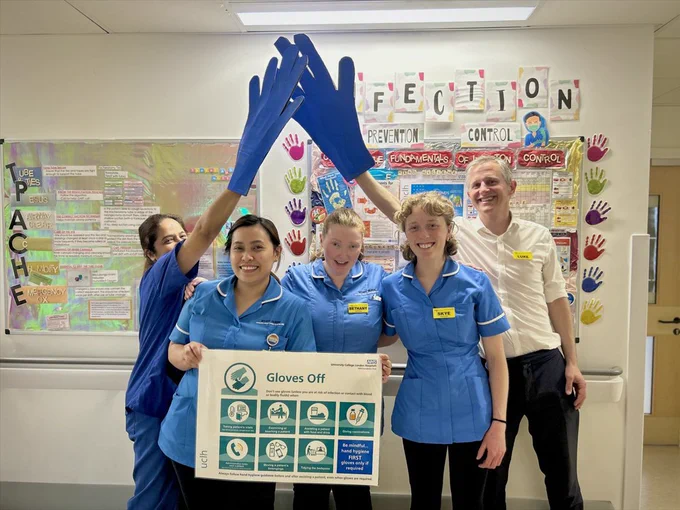 UCLH director of innovation Luke O'Shea with staff on T14, where glove usage has been reduced by more than 30 per cent.
