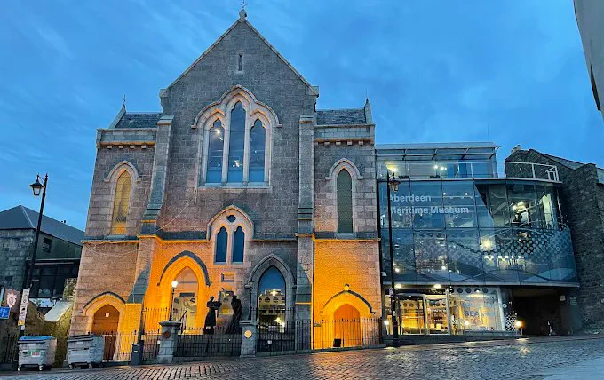 Photograph source unknown.
Aberdeen Maritime Museum lit up.