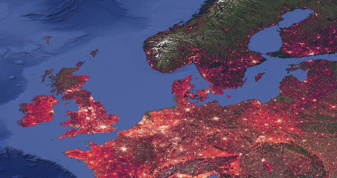 An image of WorldPop Global2 population estimates overlaid on satellite imagery for Northern Europe showing high population numbers in white and lower numbers in red. 2025