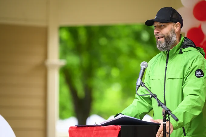 Photo of Matthew Kampfe speaking at the 2025 Vancouver Heart and Stroke Walk.