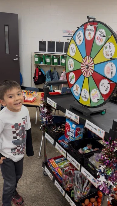 Smiling Student at Prize Wheel