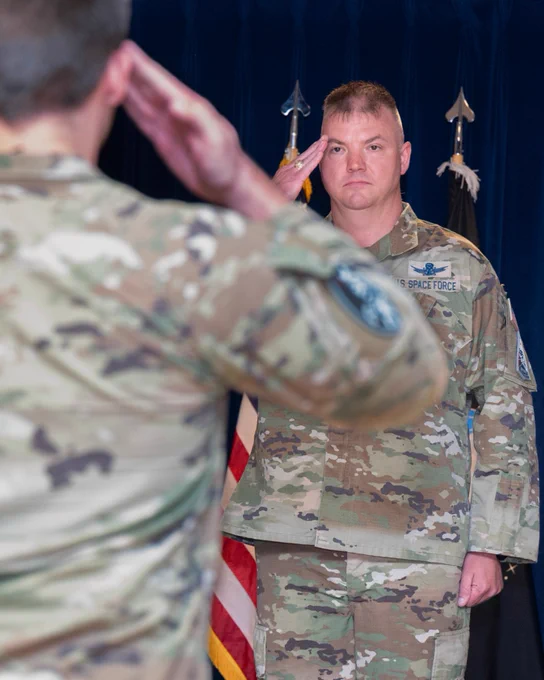 Col. Stephen Hobbs receives his first salute as commander of Mission Delta 31 at a Change of Command Ceremony at Peterson Space Force Base. 