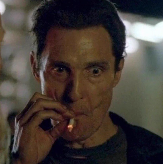 Meme of that guy taking a drag in a cigarette like his sanity depends on it. 