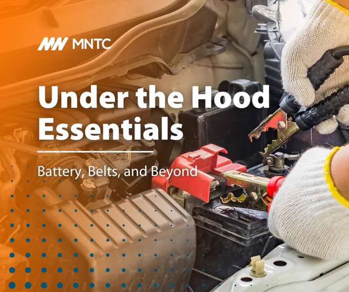 An individual wearing gloves works on a car engine, focusing on the battery with tools nearby. Text overlay reads 'Under the Hood Essentials – Battery, Belts, and Beyond' with the MNTC logo in the corner.
