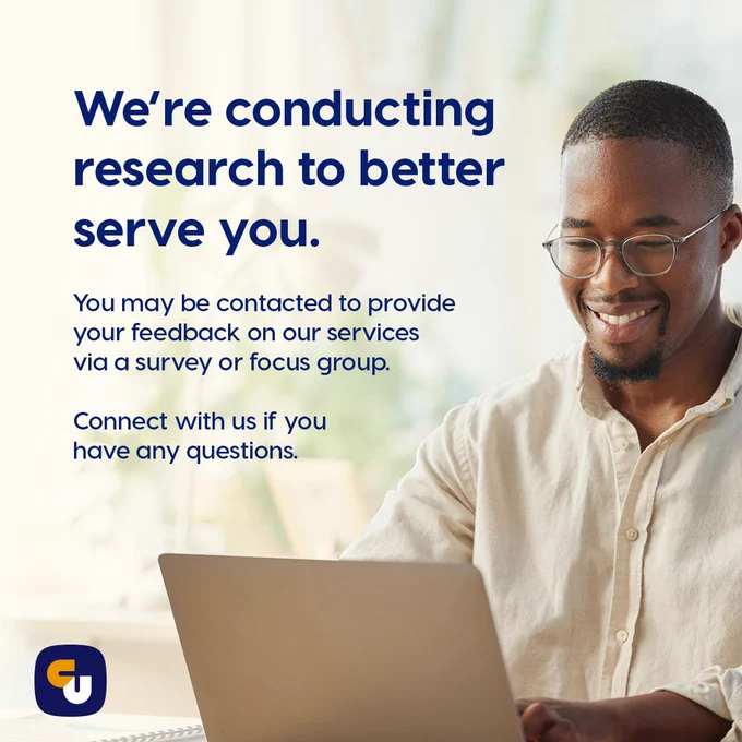 person sitting at a laptop doing a survey