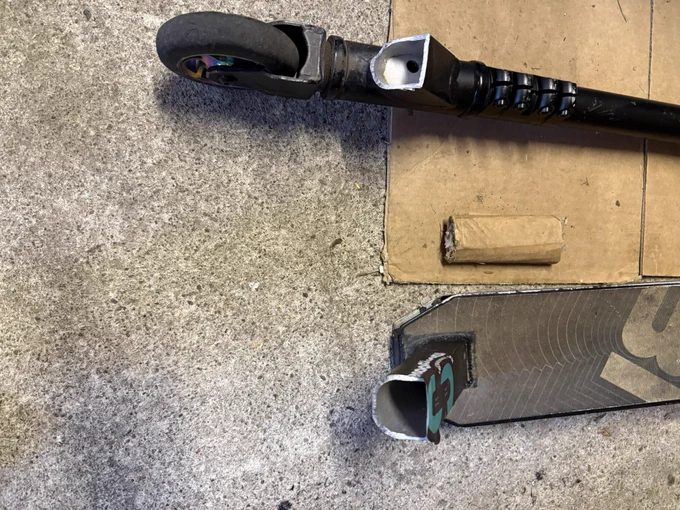 A mongoose stunt scooter cracked at the neck of the deck