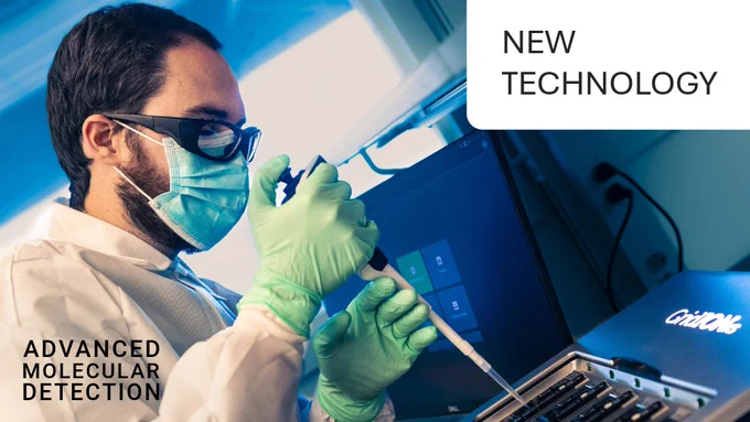 Health scientist preparing a sequencing instrument for whole genome sequencing. Text overlay states: “New Technology” and “Advanced Molecular Detection.” 