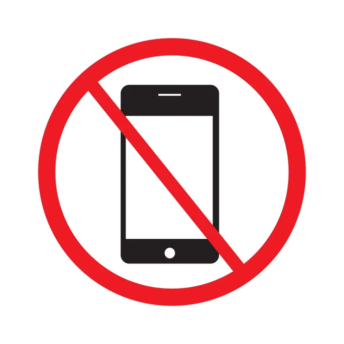 "No phones" sign