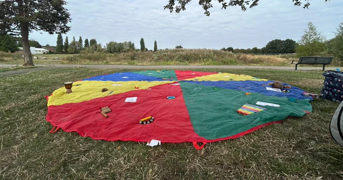A play parachute at an Early Help summer activity session