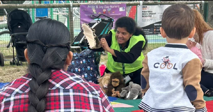 An Early Help worker entertaining families
