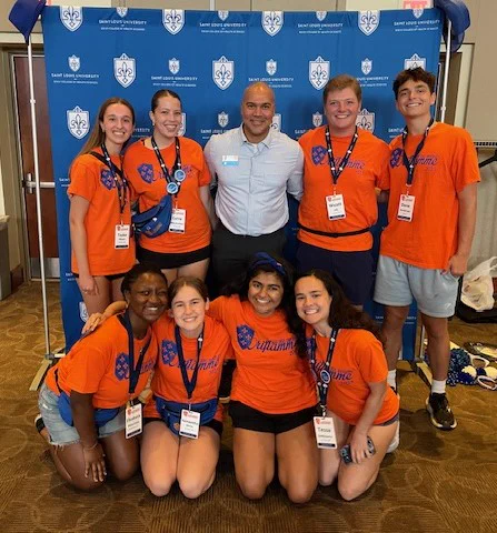 Dean Rousseau pictured with Oriflamme student leaders during the 2025 Doisy College of Health Sciences New Student Orientation on August 18, 2025 on the campus of Saint Louis University