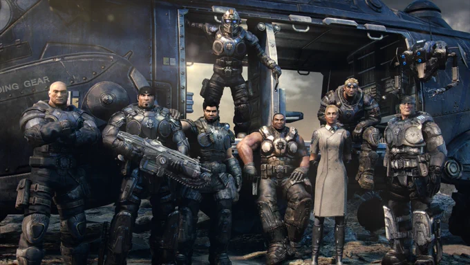 Throwback picture of main COG characters in Gear of War: Reloaded posing in front of a stationary King Raven. From left to right: Kim Young Minh, Marcus Fenix, Dominic Santiago, Augustus Cole, Anya Stroud, and Victor Hoffman. Behind and slightly above them appear Anthony Carmine and Damon Baird standing and sitting in the helicopter, respectively. 