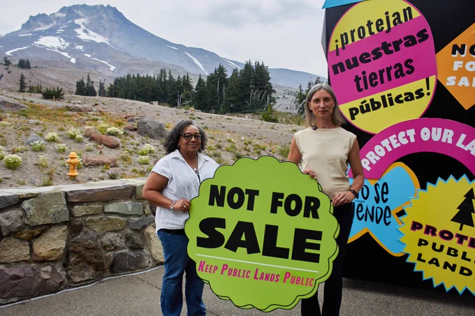 Rep. Dexter with advocate in front of public lands art installation at Mt. Hood