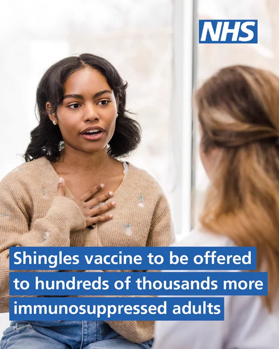 A young woman is speaking to a healthcare professional in a bright consultation room. NHS logo in the top right corner. Text reads: "Shingles vaccine to be offered to hundreds of thousands more immunosuppressed adults."