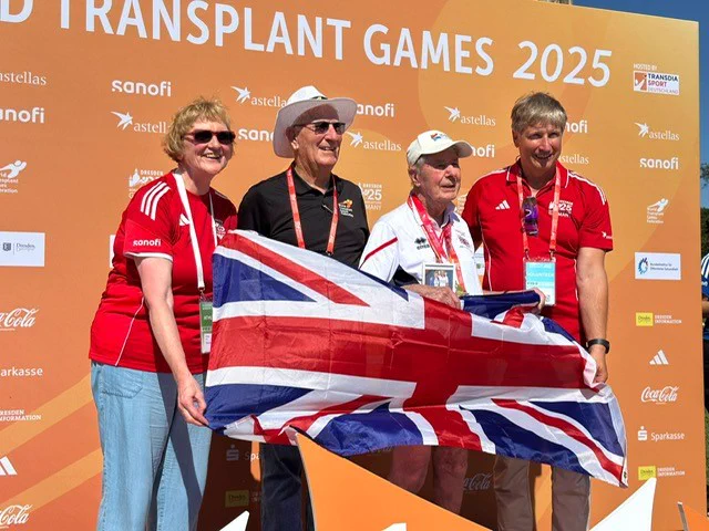 Mike Gibbons and others holding the Union Jack © Holly Cross