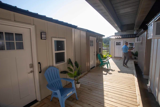 the exterior of the tiny home village at the sulzbacher center