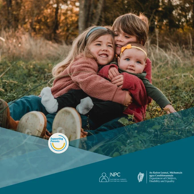 This graphic is promoting the National Parents Councils Helpline, it  contains a photograph of two young children and a toddler hugging in an outside setting and is set against the Department of Children, Disability and Equality’s teal colours. It has the DCDE, Supporting Parents and National Parents Council logos.