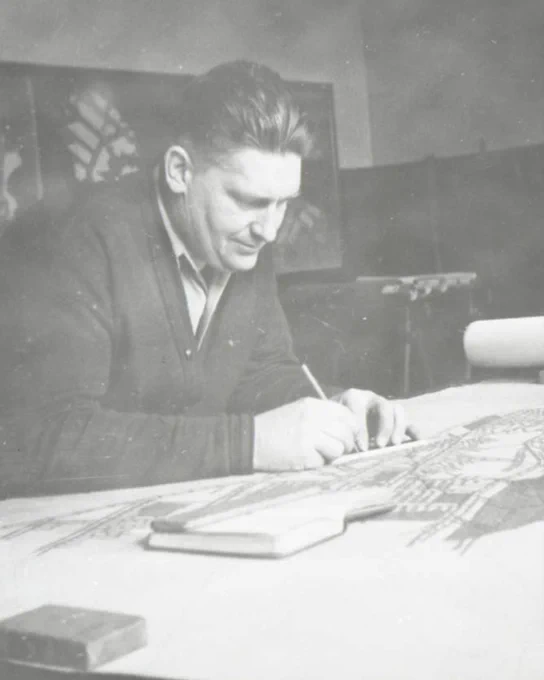 Picture of Francis L Thompson drawing a mine map