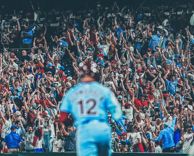The crowd celebrates Kyle Schwarber's 4th home run of the night